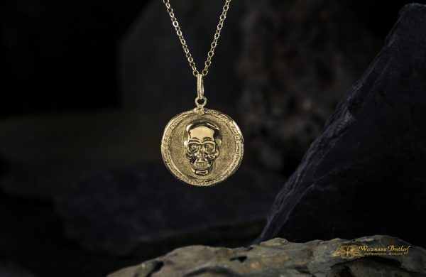 gold skull pendant
